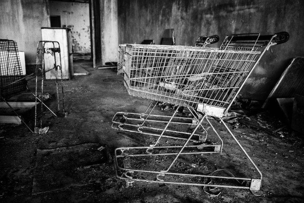 trolley or shopping cart in abandoned supermarket in Chernobyl