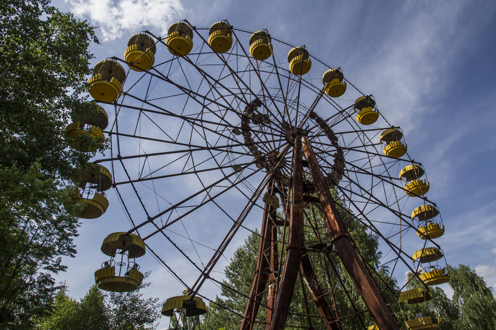 decaying ferris wheel in the abandoned amusement park in Pripyat, Chernobyl