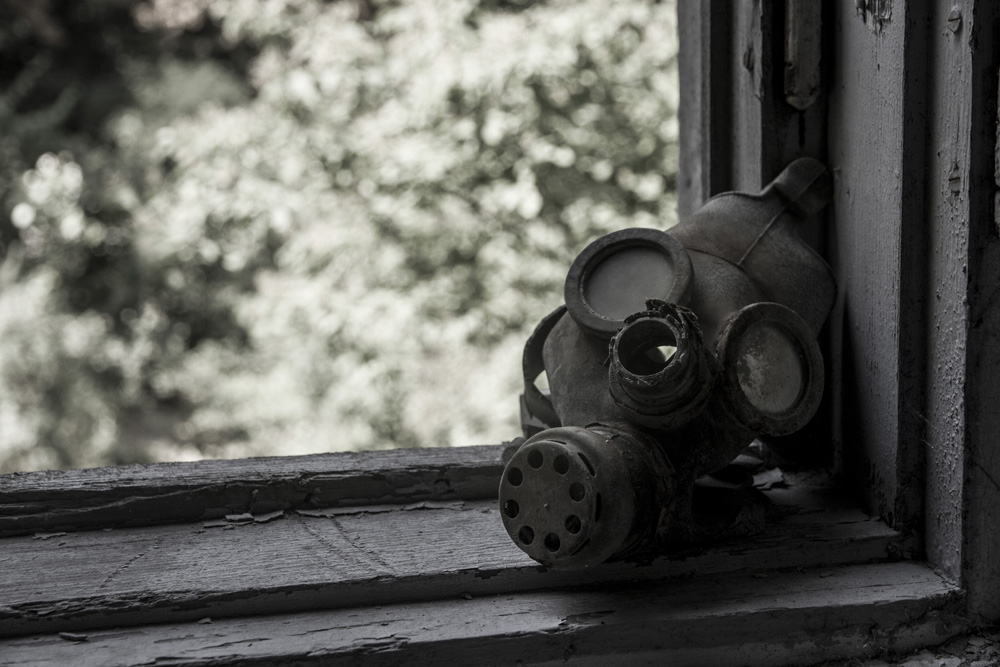 gas mask near a window in Chernobyl