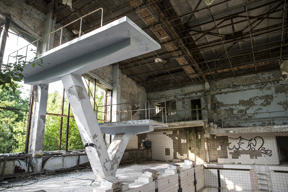 diving board in abandoned pool area in Chernobyl