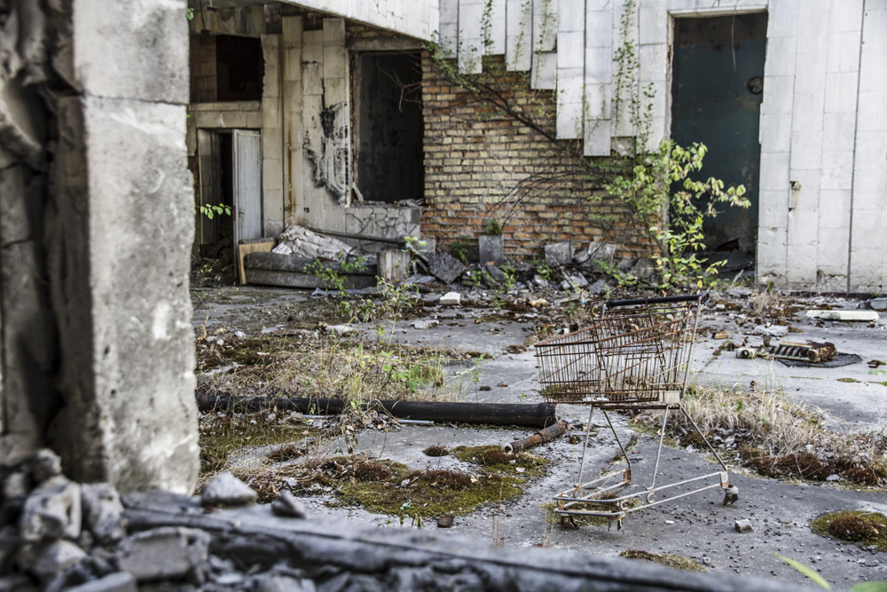 an old shopping cart outside the abandoned supermarket in Pripyat, Chernobyl