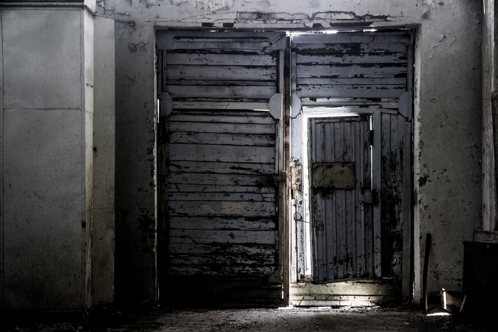 old doors of an abandoned building in Chernobyl