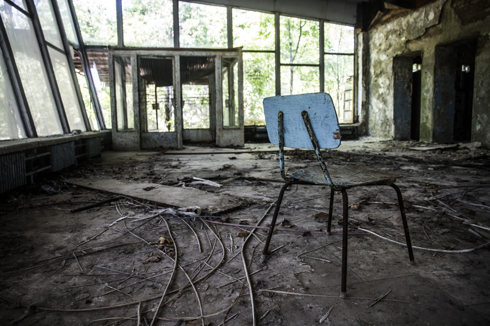chair in an a room in abandoned bus station in Pripyat, Chernobyl